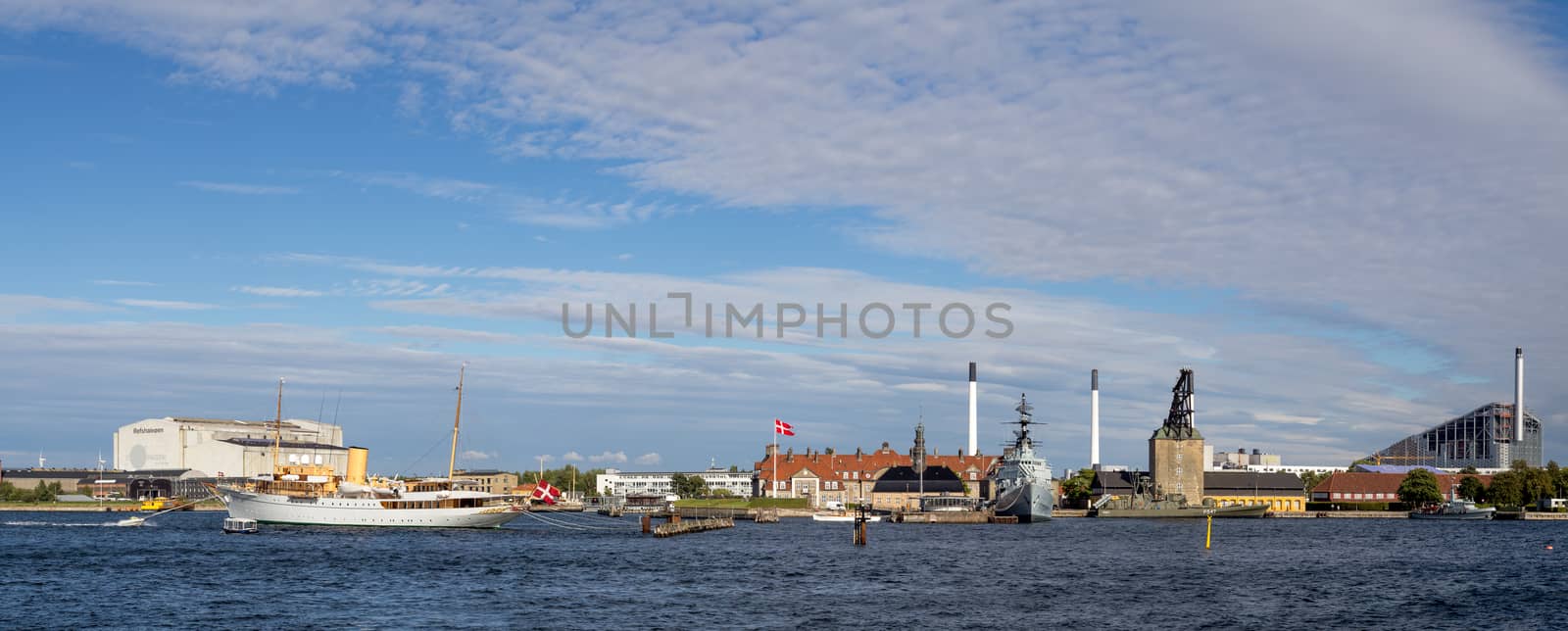 Copenhagen, Denmark - August 17, 2016: Panoramic view of Copenhagen harbor with the Royal Danish yacht and the Danish naval base