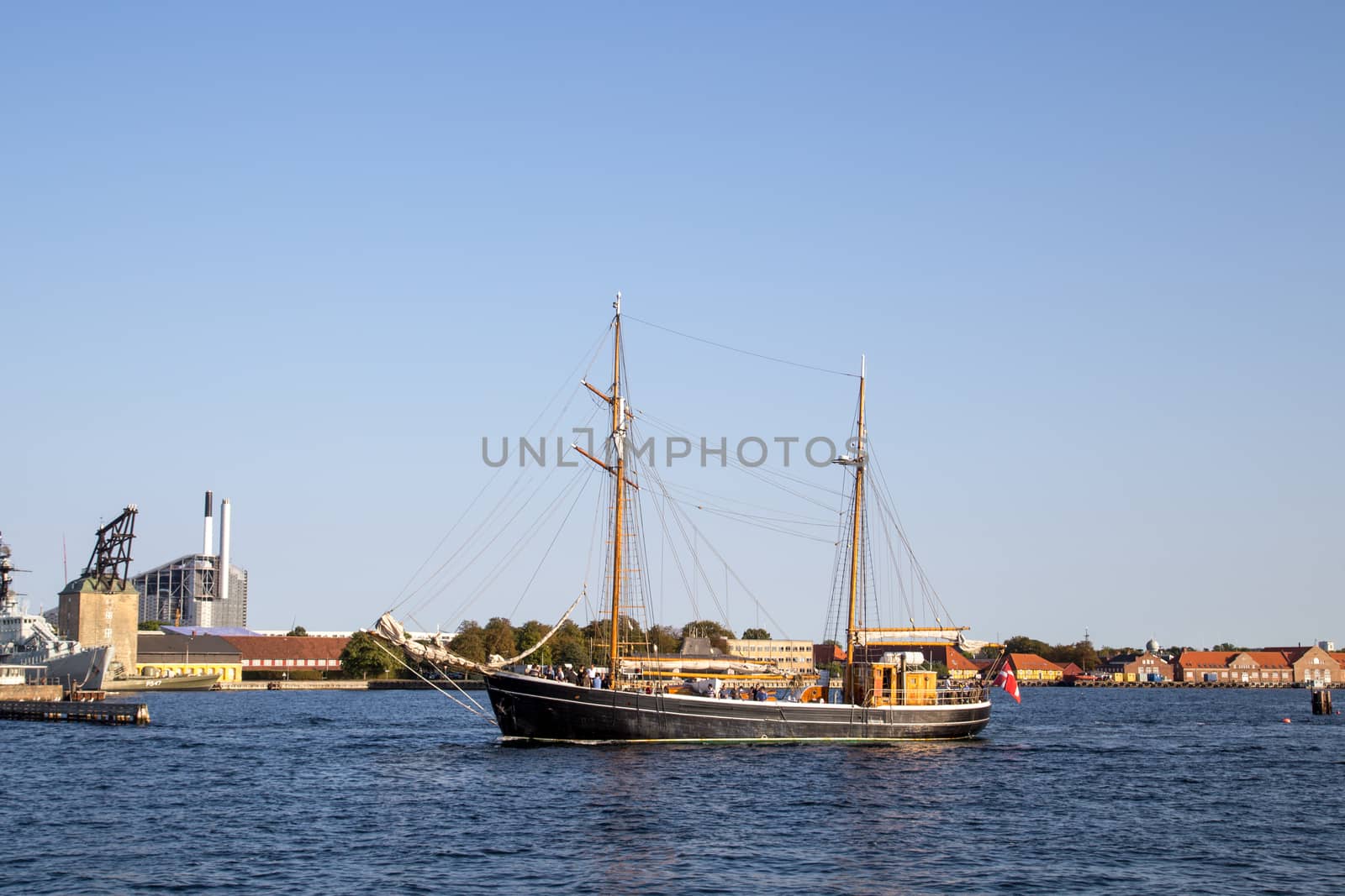 Copenhagen, Denmark - September 14, 2016: A sailboat cruising through Copenhagen harbor