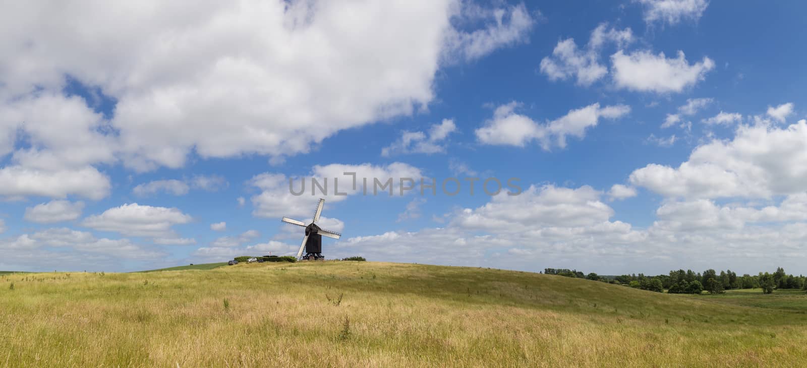 Hoejerg, Denmark - June 19, 2016: Panoramic view of Historic Danish windmill called Pibe Moelle.