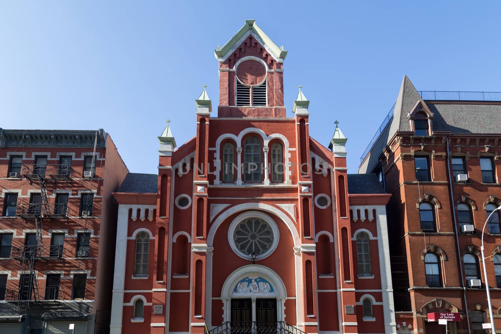 New York, United States of America - November 17, 2016: Red facade of the Church of Our Lady of Sorrows in Manhattan