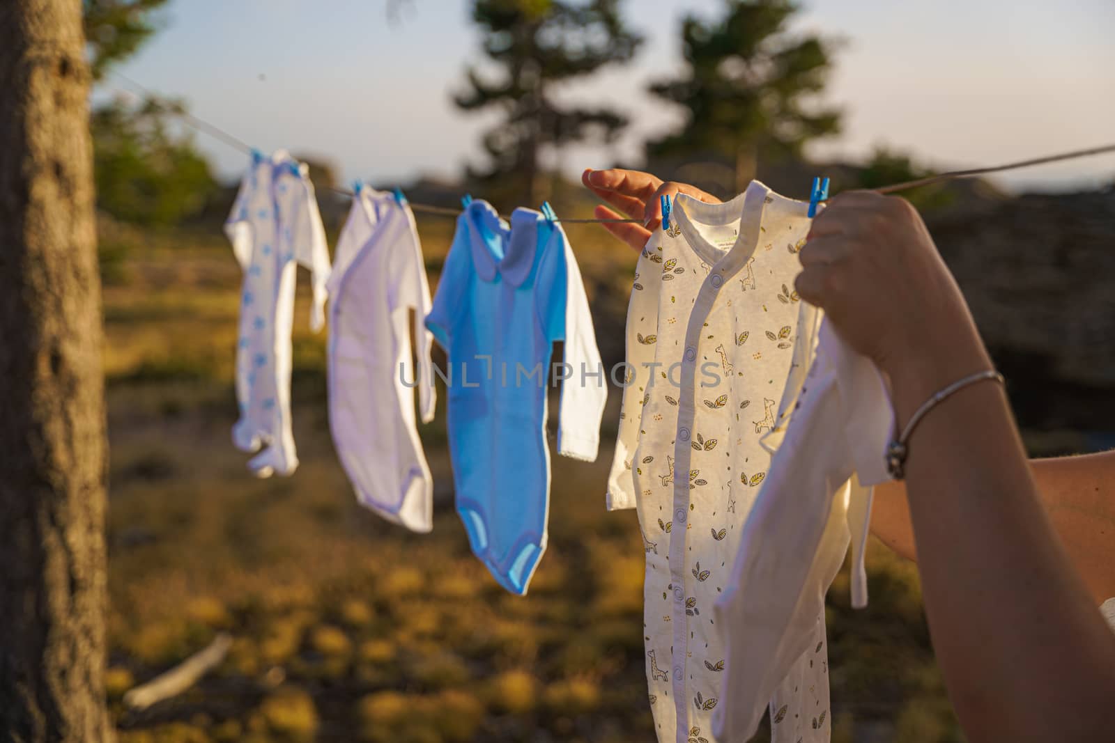 Baby goods hanging on the clothesline.