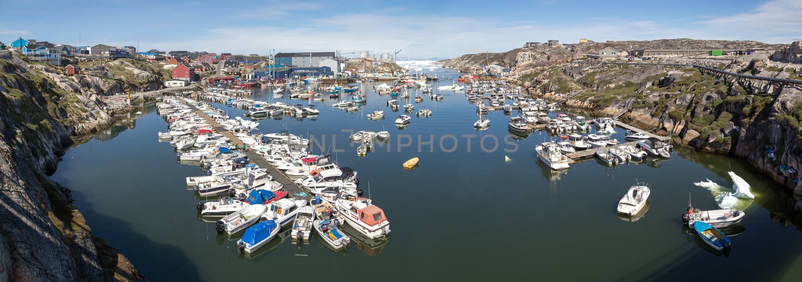 Ilulissat, Greenland - July 03, 2018: Panoramic view of the harbor in Ilulissat
