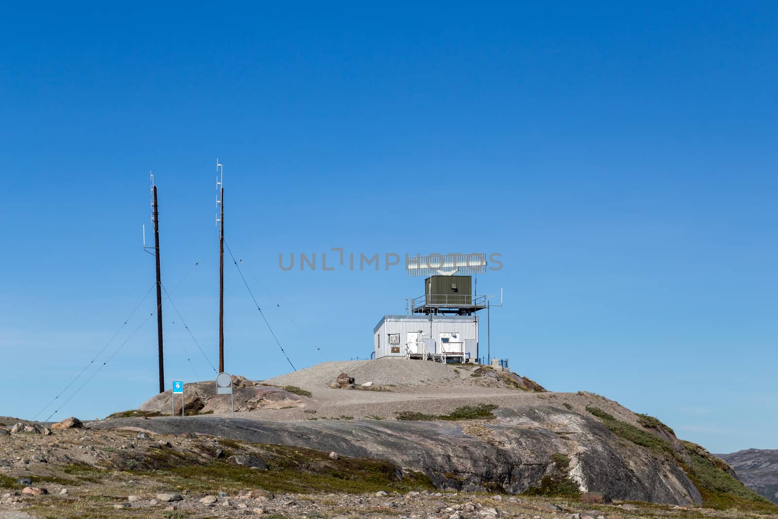 Kangerlussuaq, Greenland - July 13, 2018: Radar Tower Station close to the aiport. Kangerlussuaq is a settlement in western Greenland and Greenland's main air transport hub.