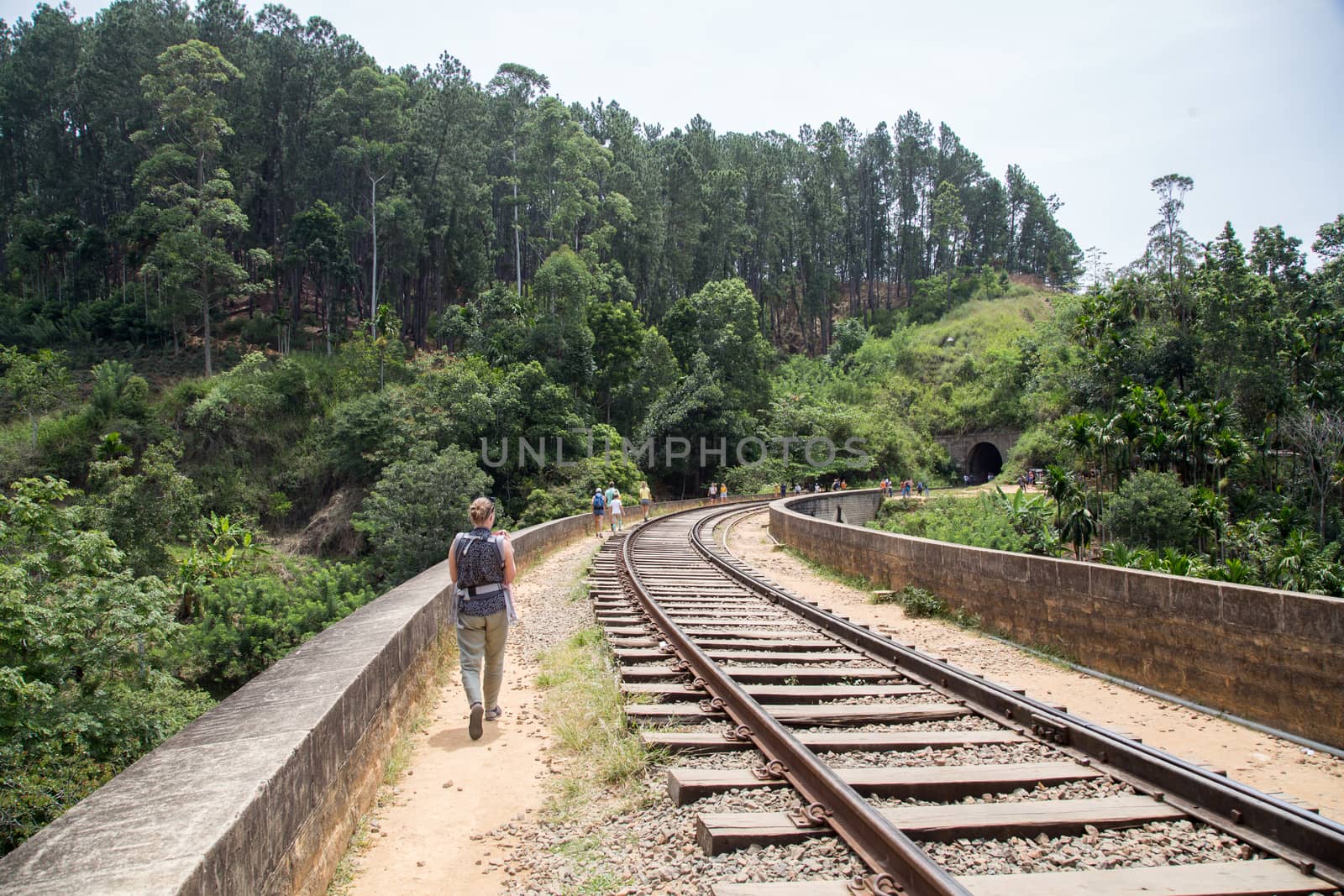 Demodara, Sri Lanka - August 4, 2018: People walking on the famous Nine Arch Bridge close to Ella