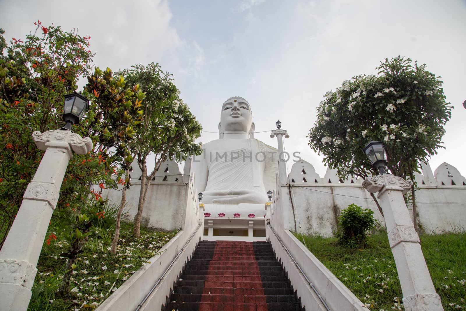 Kandy, Sri Lanka - August 10, 2018: Bahirawakanda Vihara Buddha Statue ocated on top of a hill