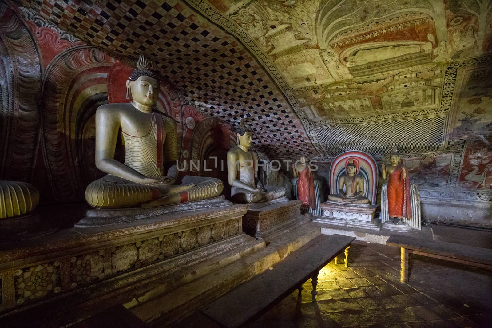 Buddha statues inside Dambulla Cave Temple, Sri Lanka by oliverfoerstner