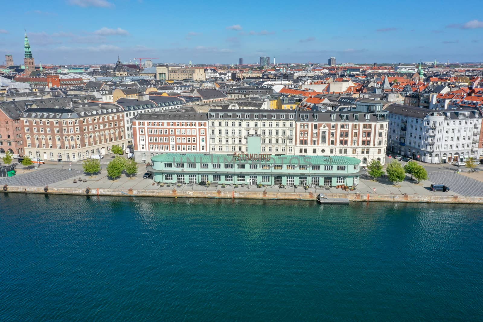 Copenhagen, Denmark - May 7, 2020: Aerial drone view of The Standard, a restaurant complex in the former custom authorities building.