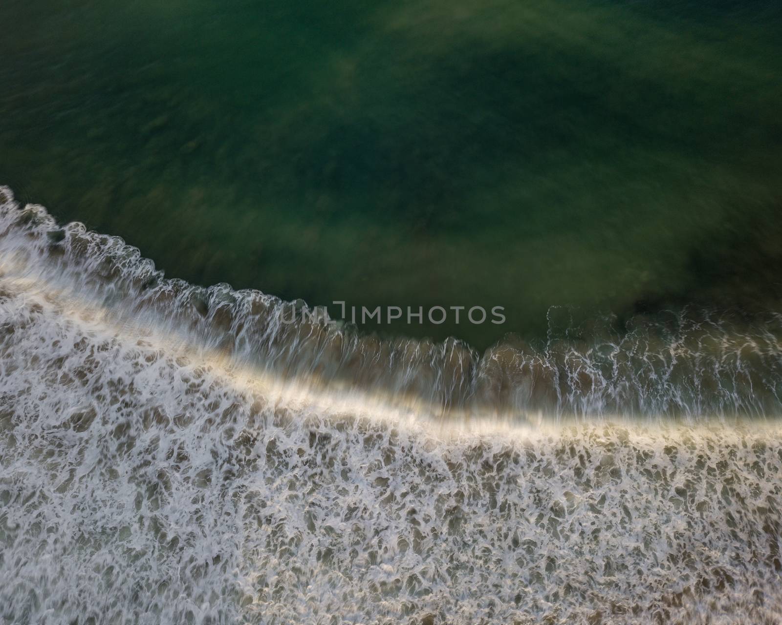 Aerial view of sea water and wave by dutourdumonde