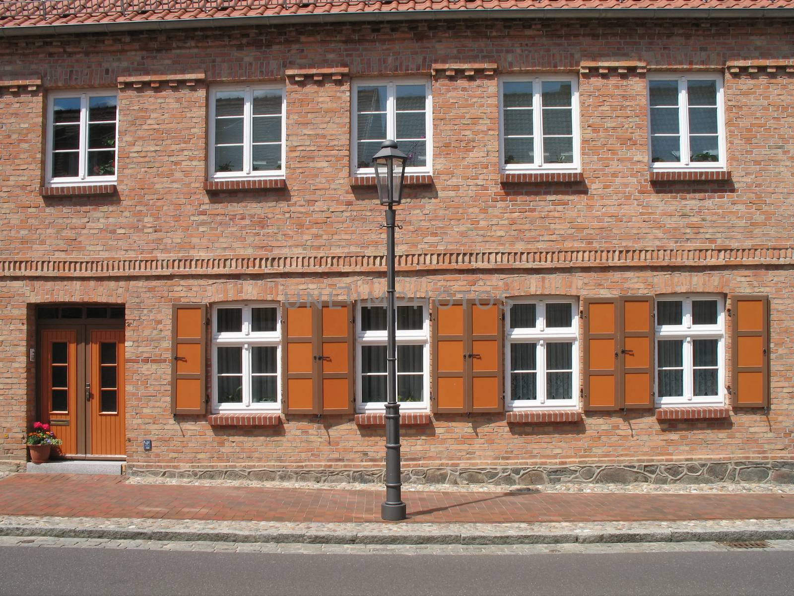 House with shutters by SchneiderStockImages