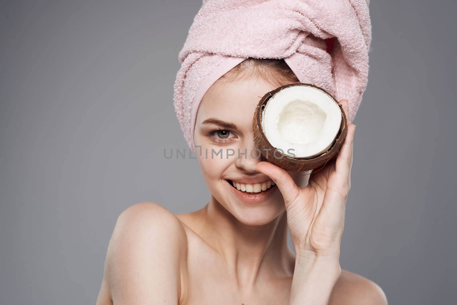 Cheerful woman naked shoulders Exotic natural cosmetics by SHOTPRIME