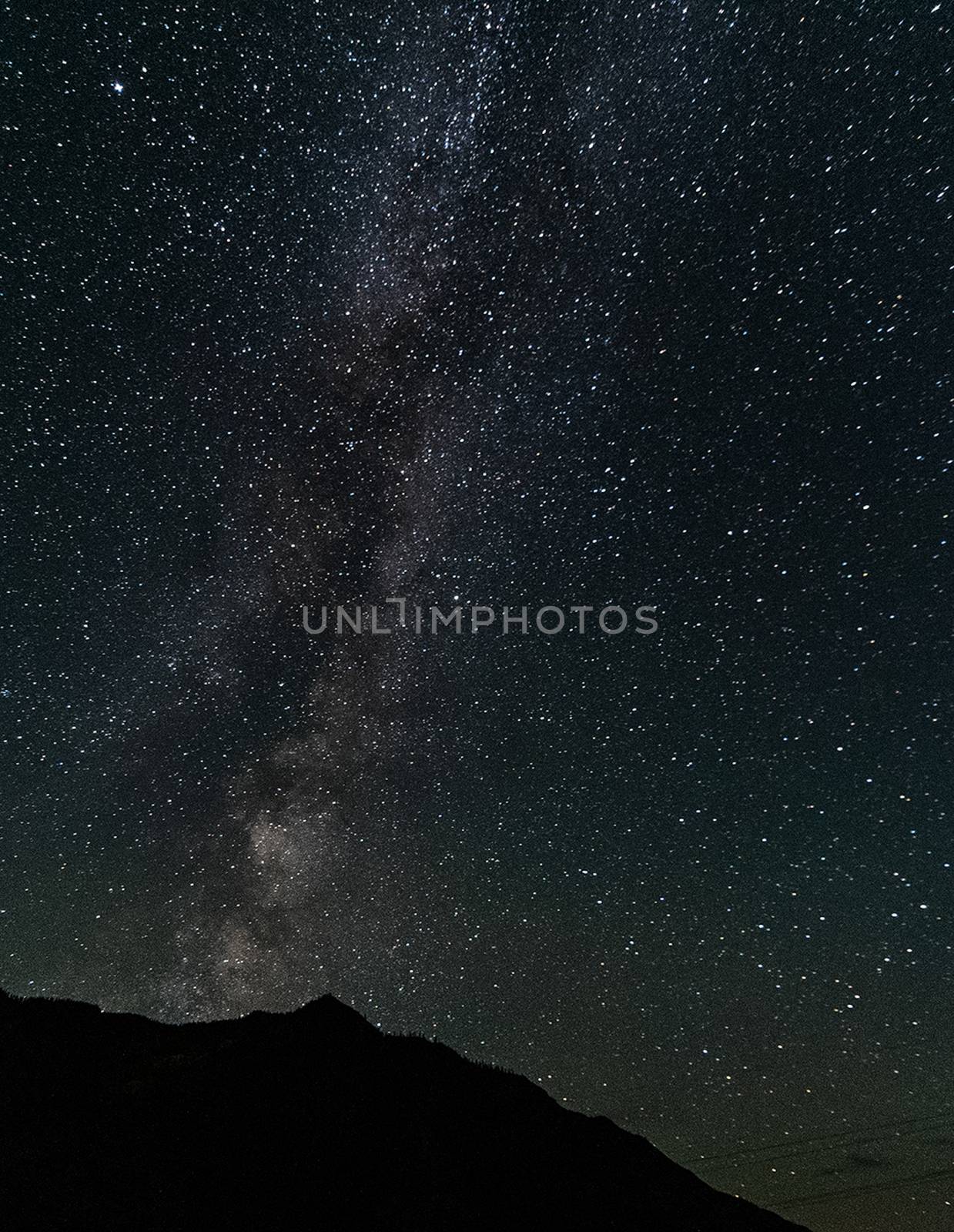 Part of the starry sky at night over the altai mountains.