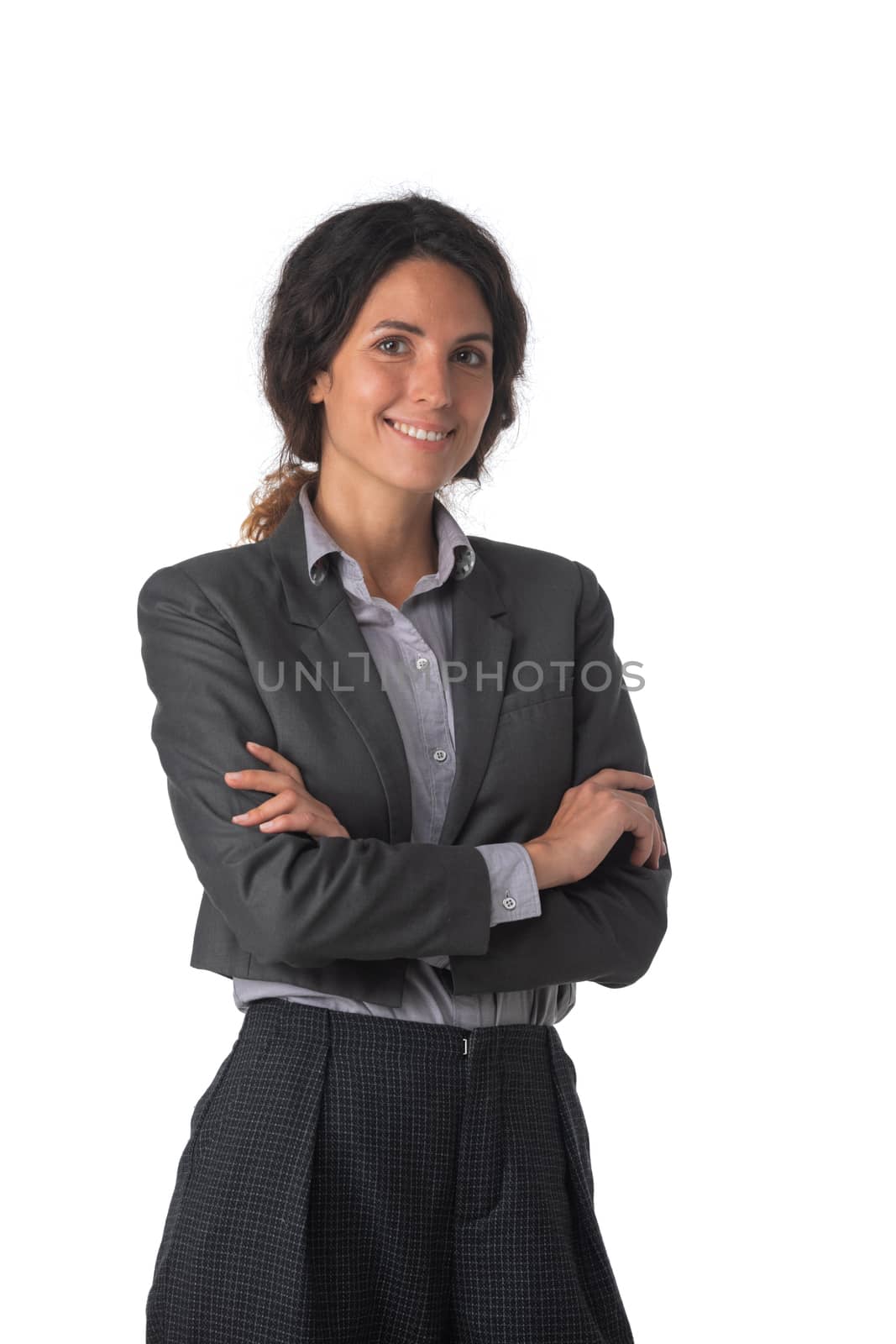 Portrait of young business woman with arms crossed studio isolated on white background