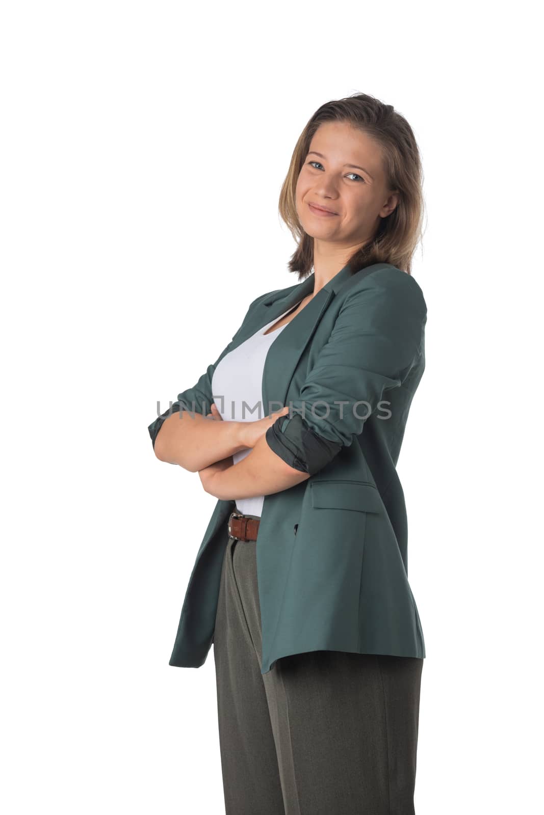 Portrait of happy young business woman with arms folded isolated on white background