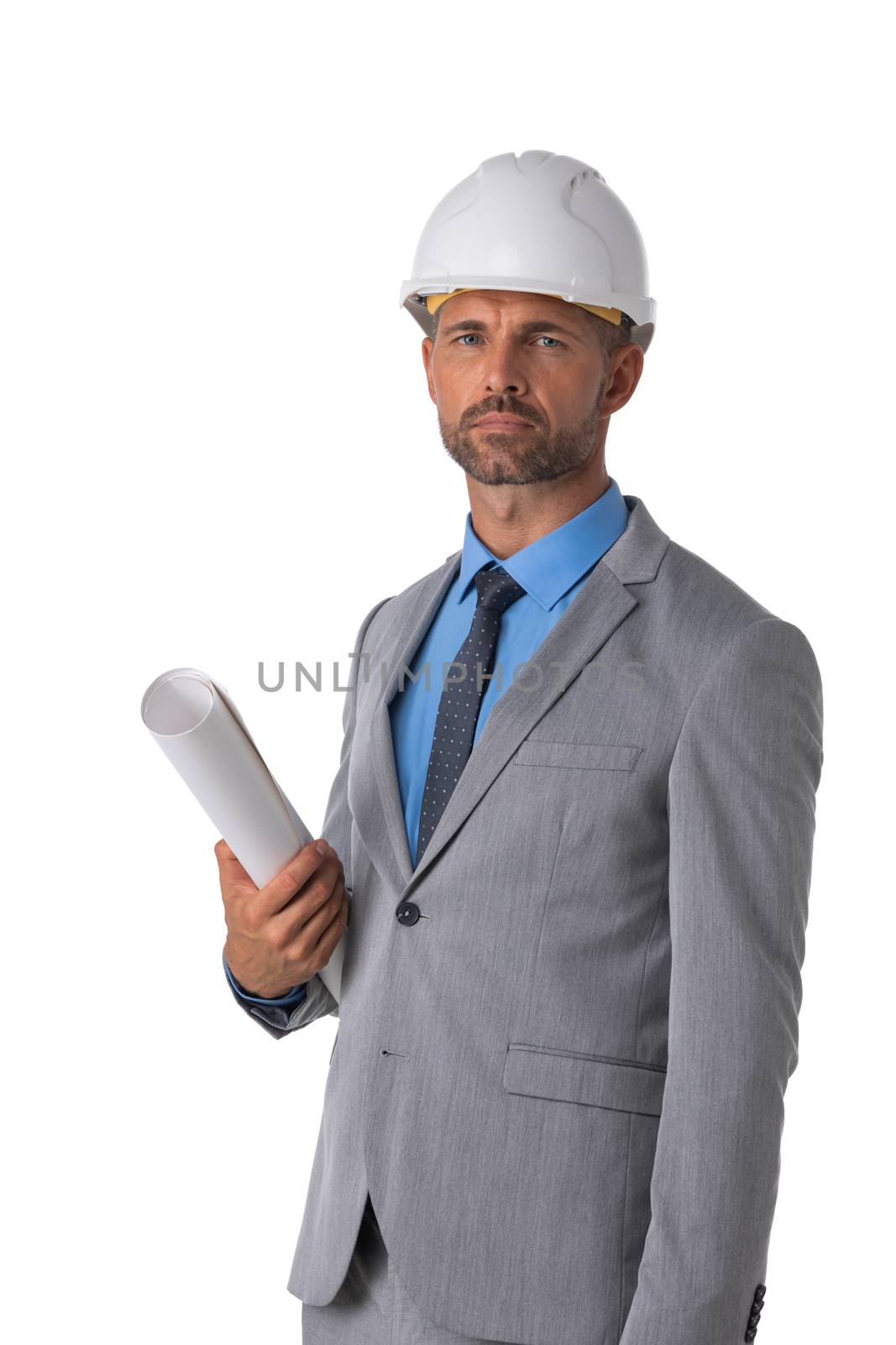 Portrait of male engeneer architect in white hardhat and business suit holding blueprint isolated on white background