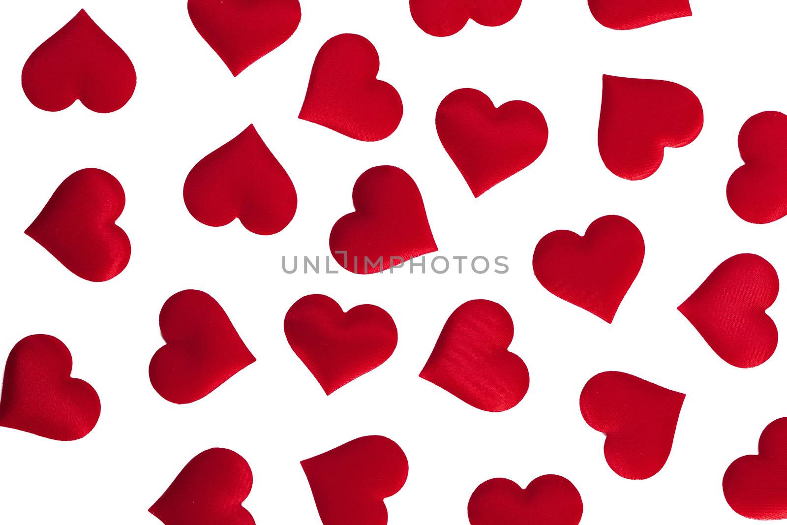 Valentine's day many red silk hearts isolated on white background, love concept