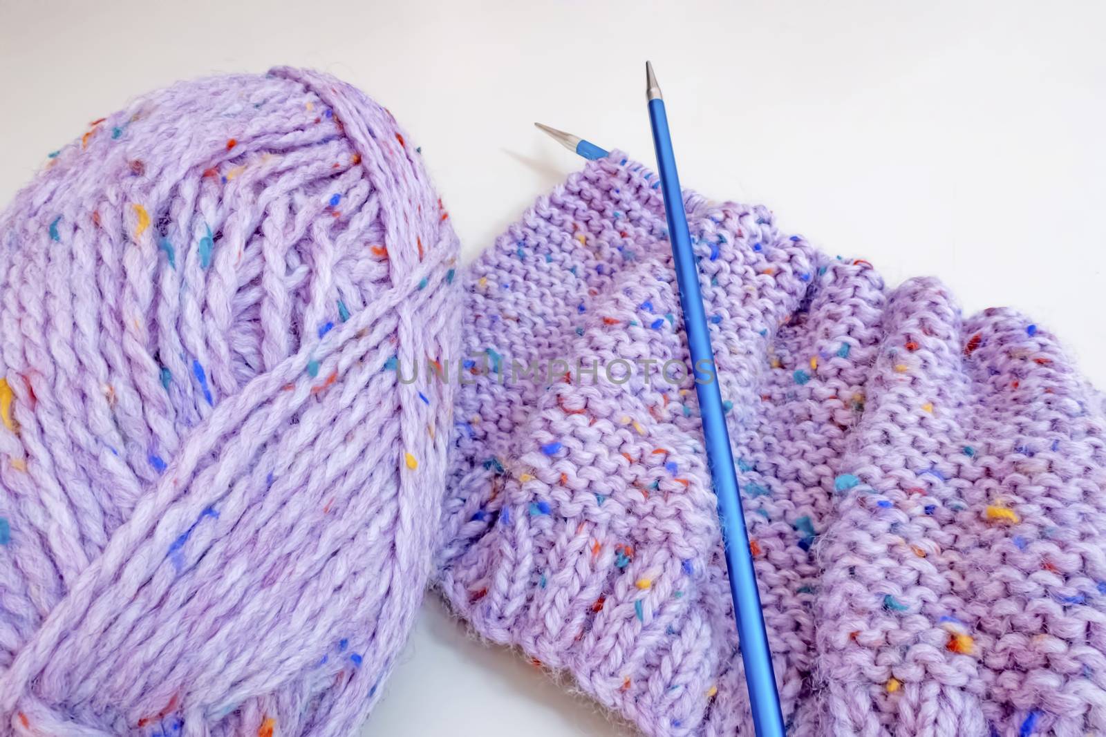 close up knitting yarn and knitting needles