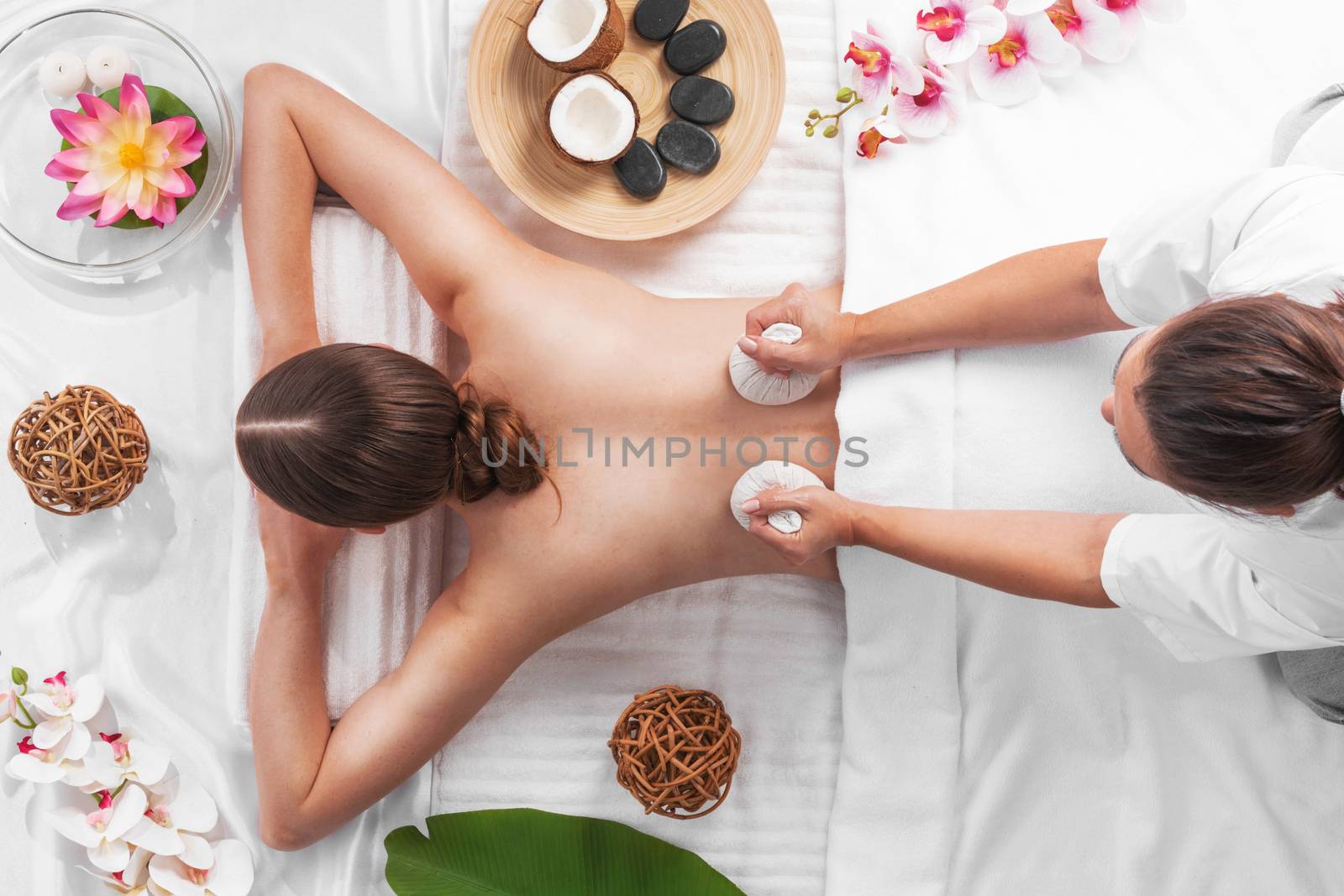 Woman at spa thai massage by ALotOfPeople