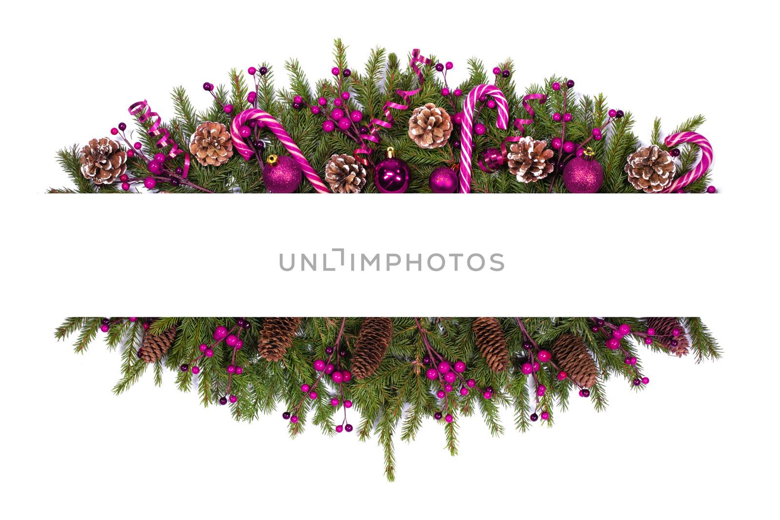 Christmas white blank card with copy space and decor of fir tree branch bauble candy cane pine cone pink holly berry isolated on white background