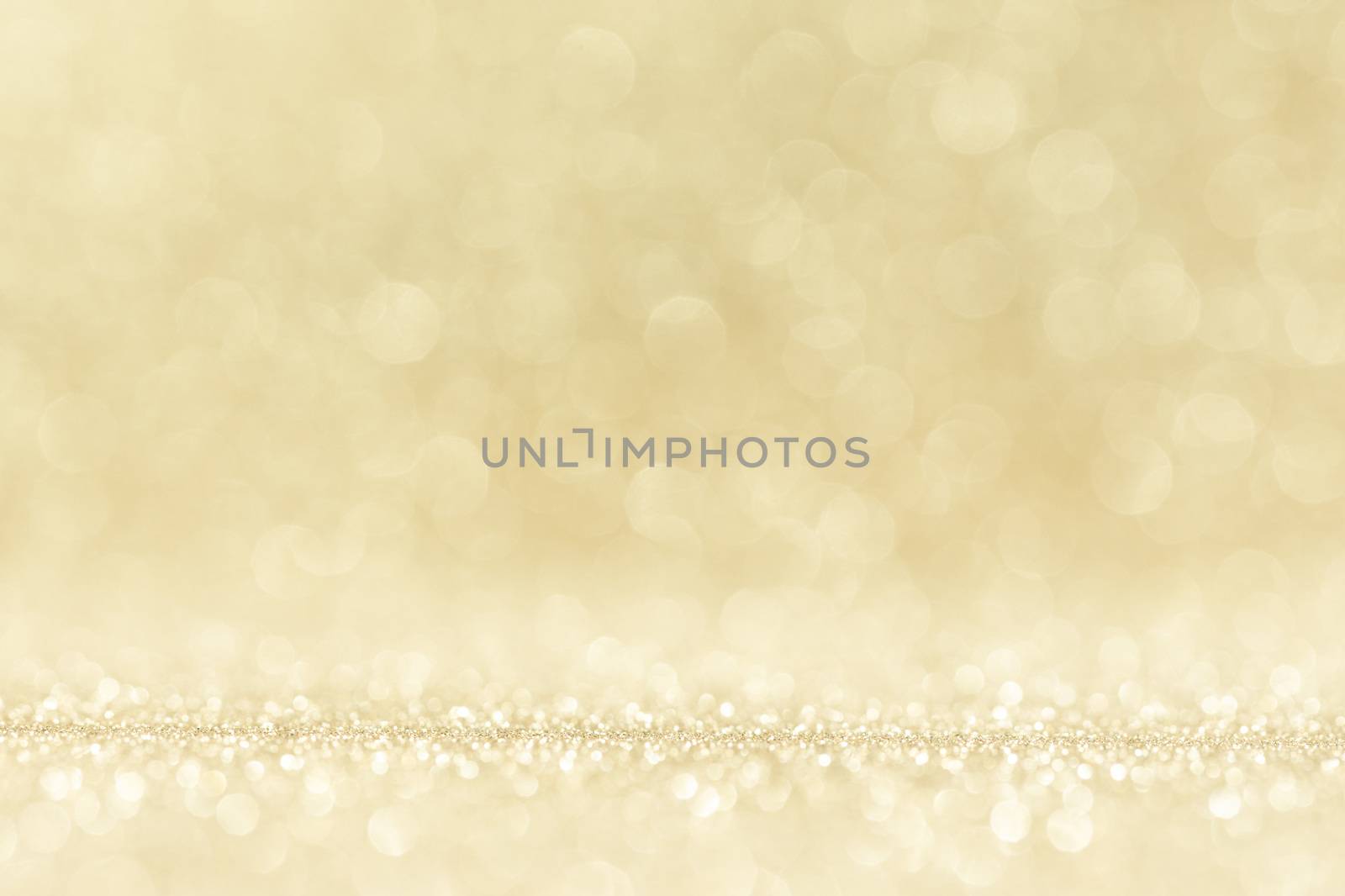 Shiny golden bokeh glitter lights abstract background, Christmas New Year party celebration concept