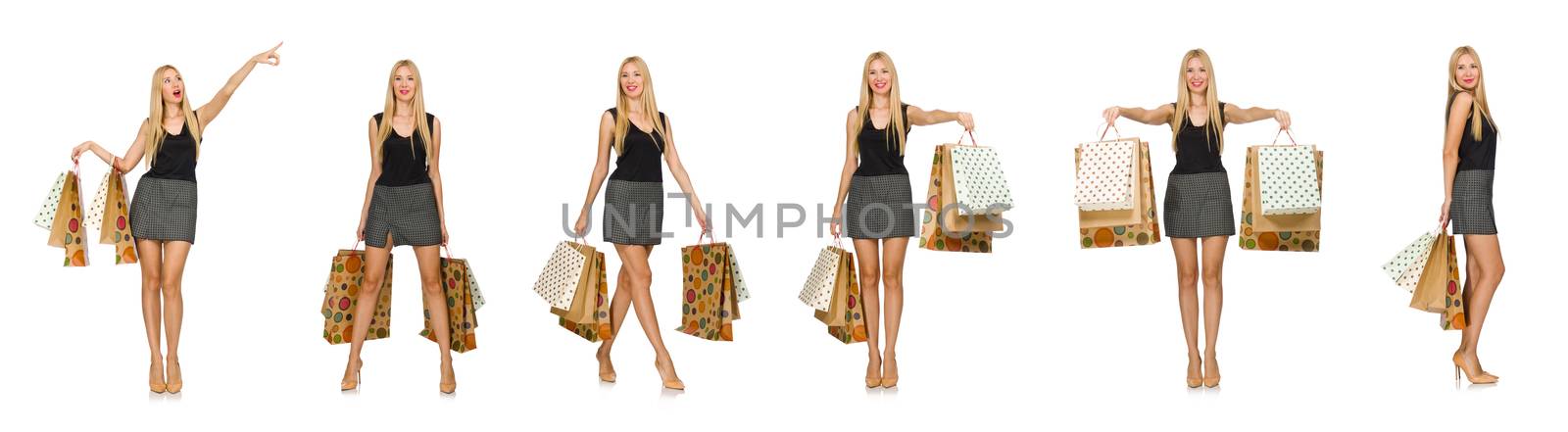 Blond hair model holding plastic bags isolated on white by Elnur