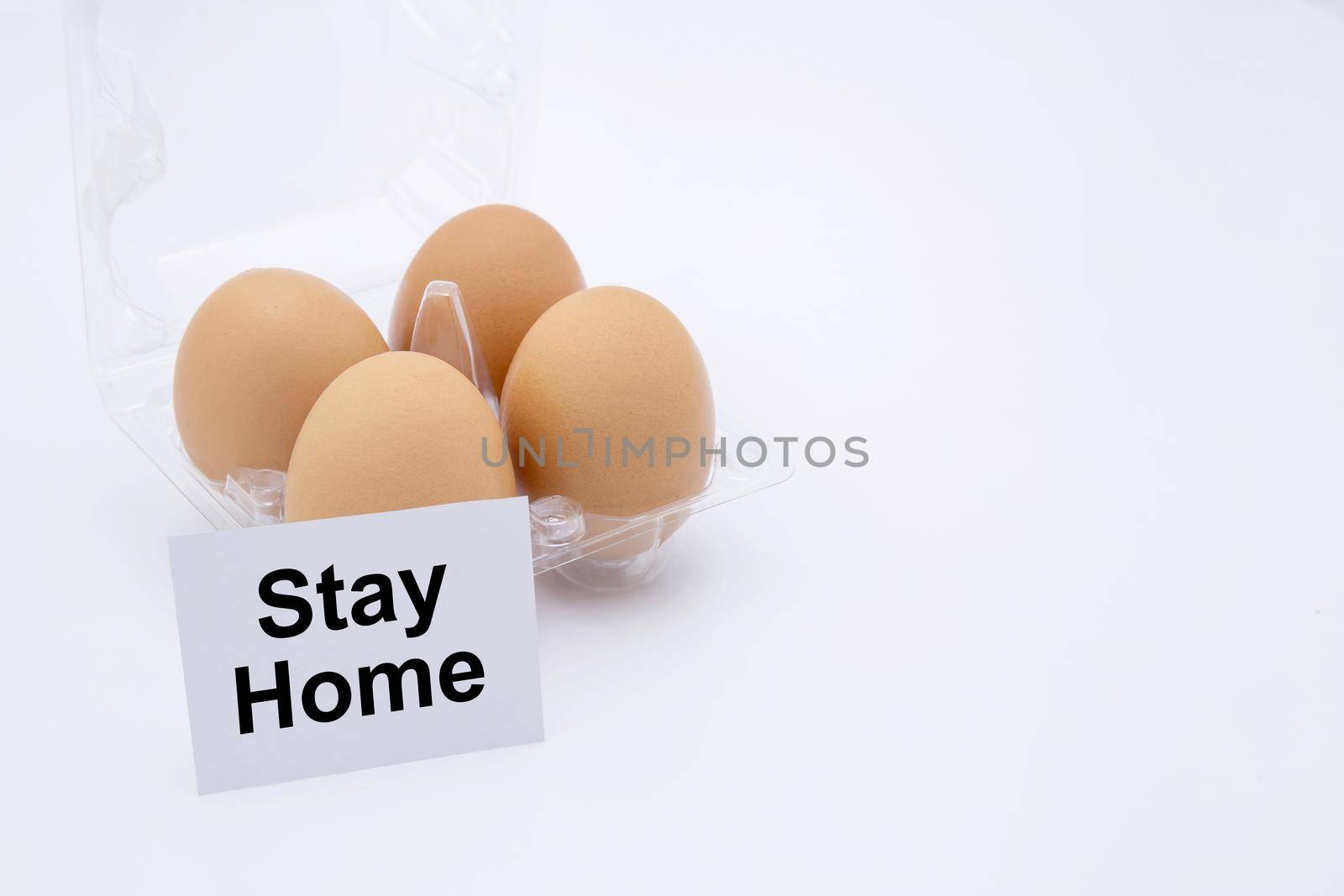 Easter egg with text stay home for protective covid-19 isolated on white background, social distancing and quarantine, stocking up on food for while pandemic coronavirus, easter day concept.