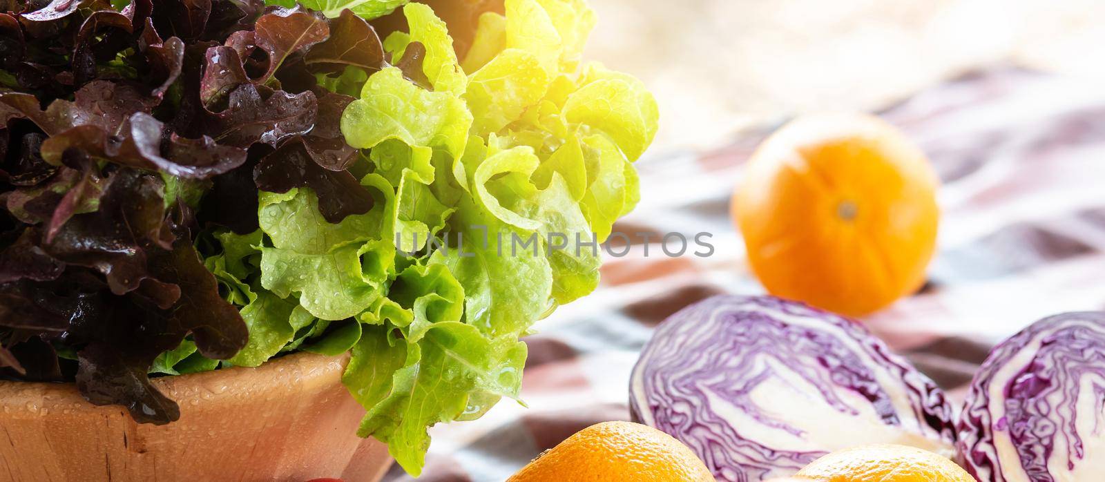 Fresh organic raw vegetable and fruit in bowl for salad on table, vegetarian and healthy food or ingredient and herb for cooking health, harvest for farm, nutrition concept, banner website.