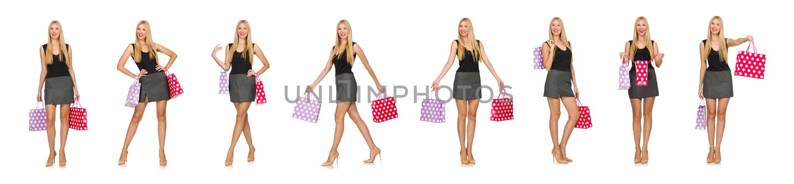 Woman with shopping bags isolated on white