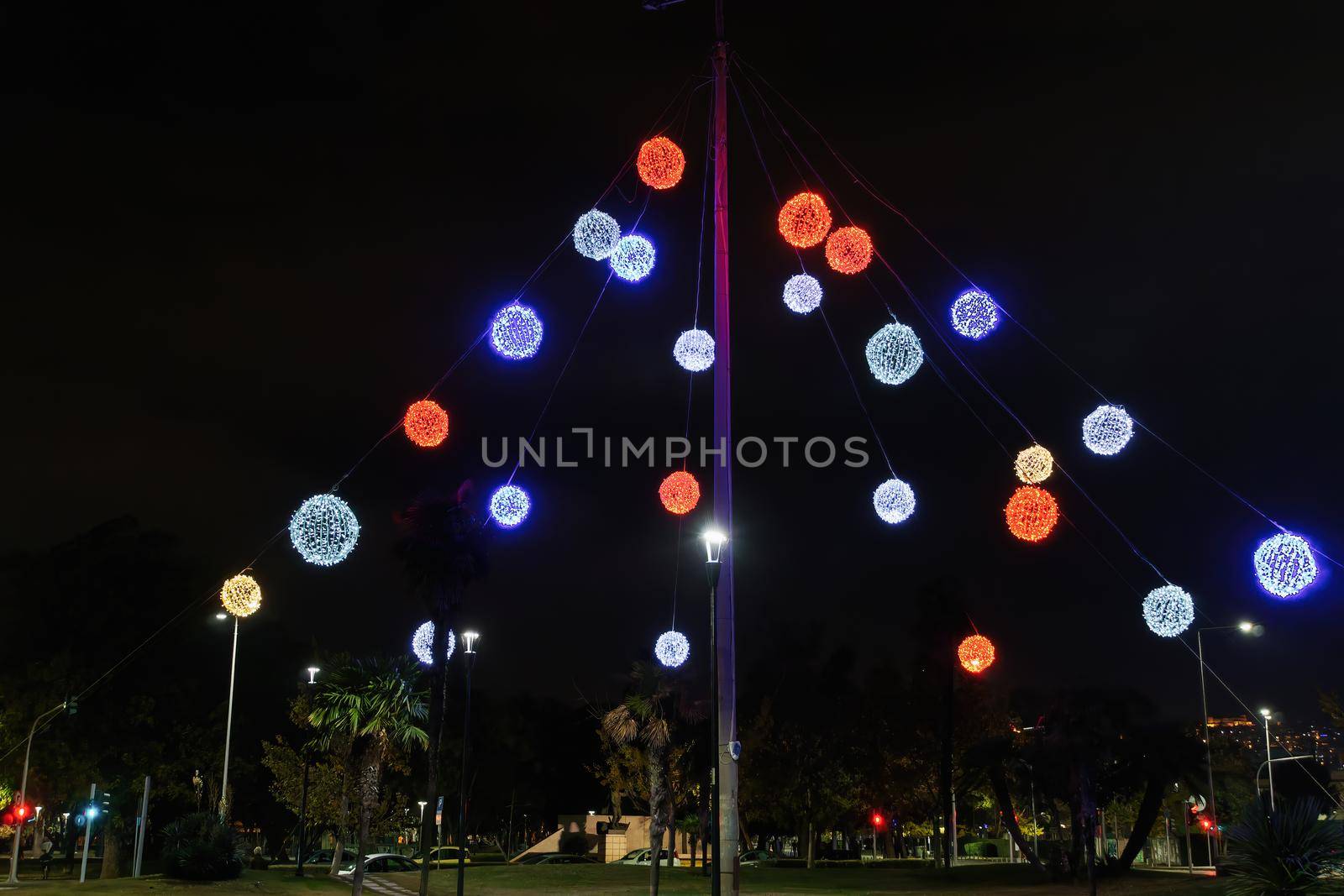Festive instalments of illuminated hanging sphere ornaments at Thessaloniki, Greece.