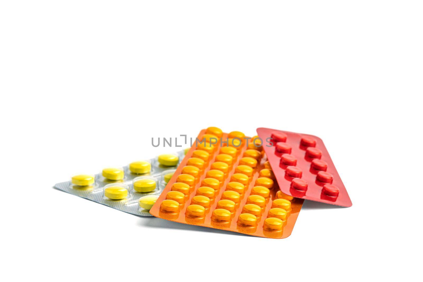 Group of medicines isolated on white. Medicinal anti-inflammatory drugs in multi-colored packaging. Pharmacy pharmacological preparations.