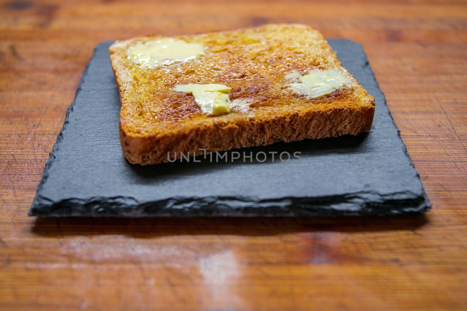 a delicious fresh bread with herb cream for the breakfast