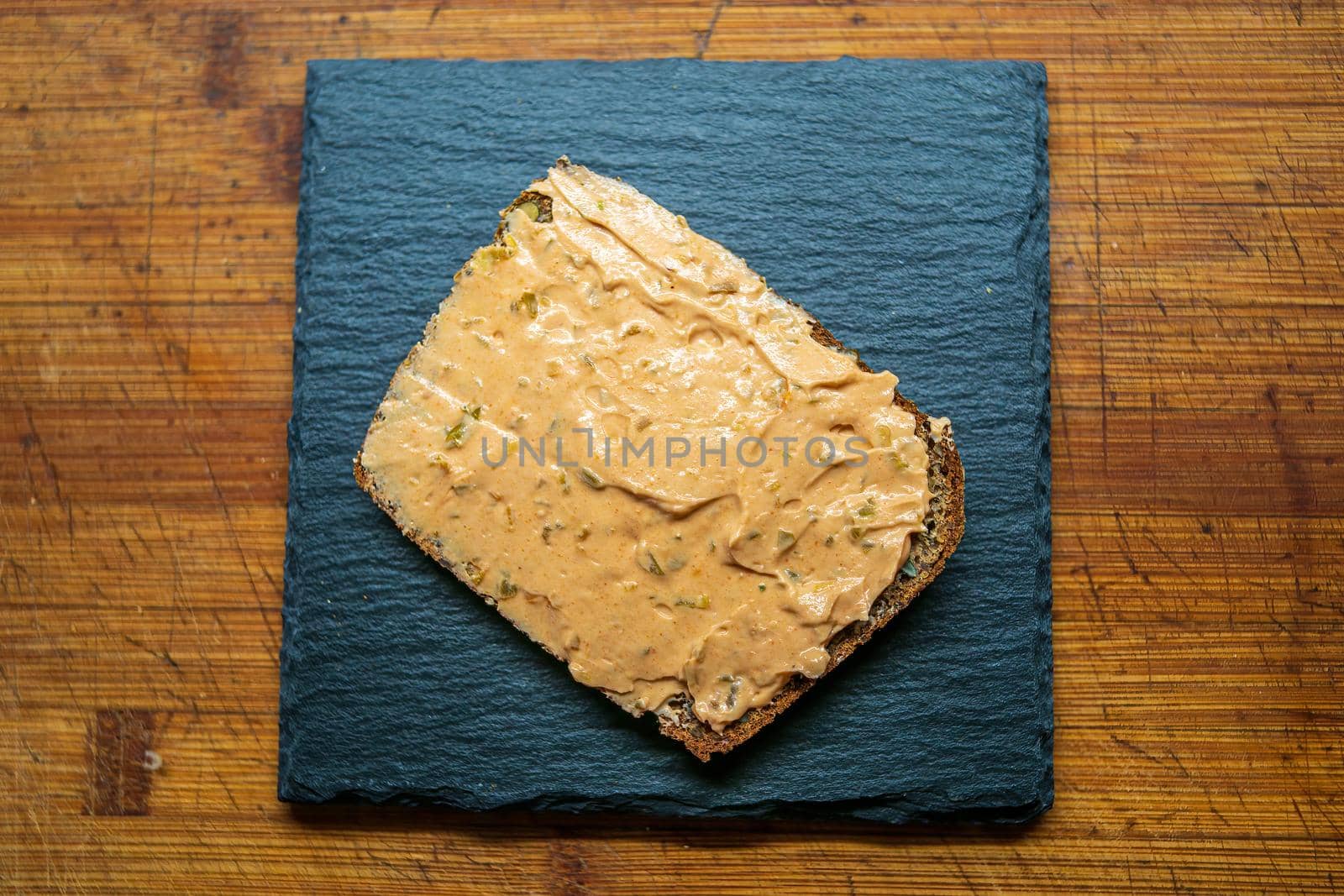 a delicious fresh bread with herb cream for the breakfast