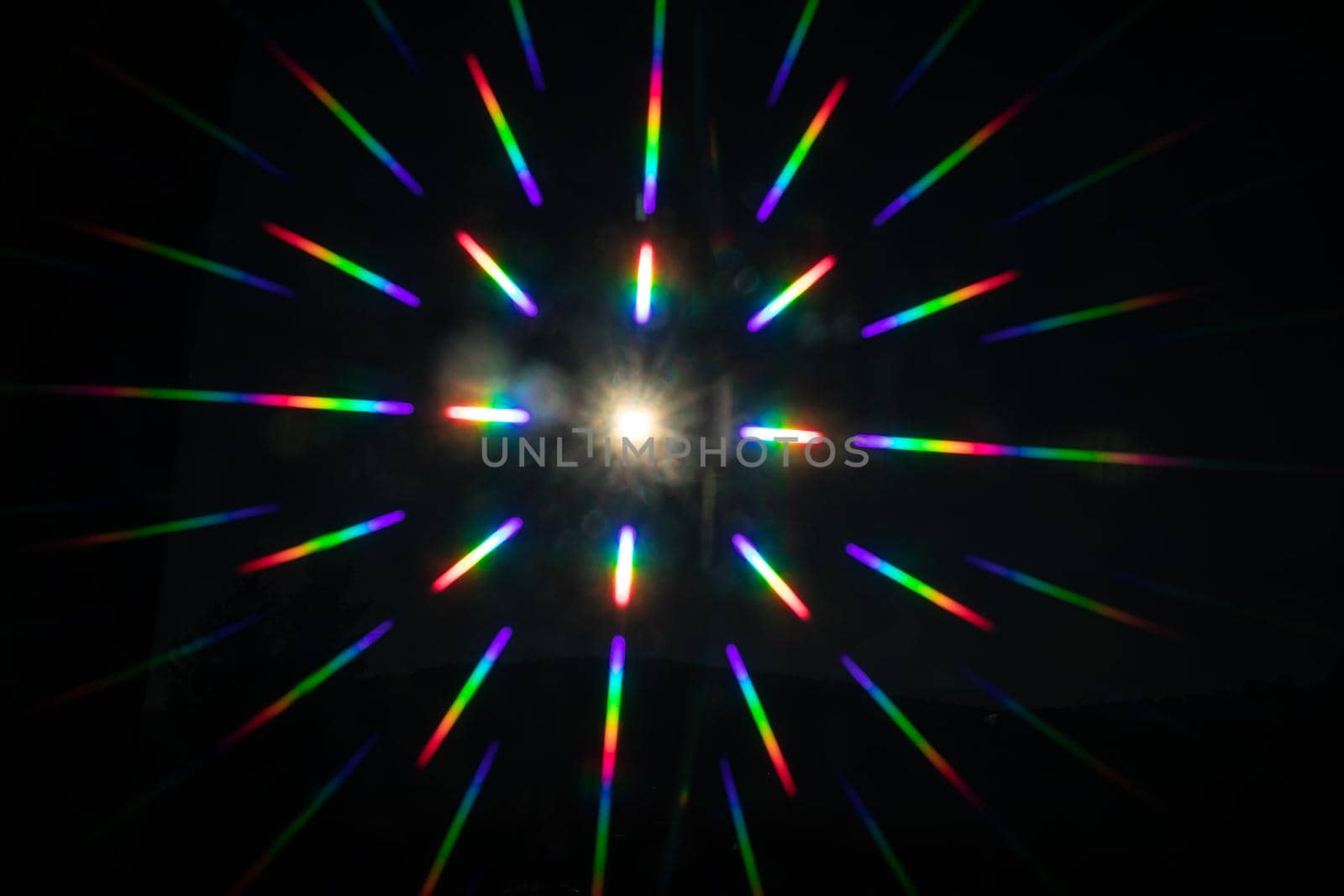 punctiform light source reflects the colors of the rainbow in all directions