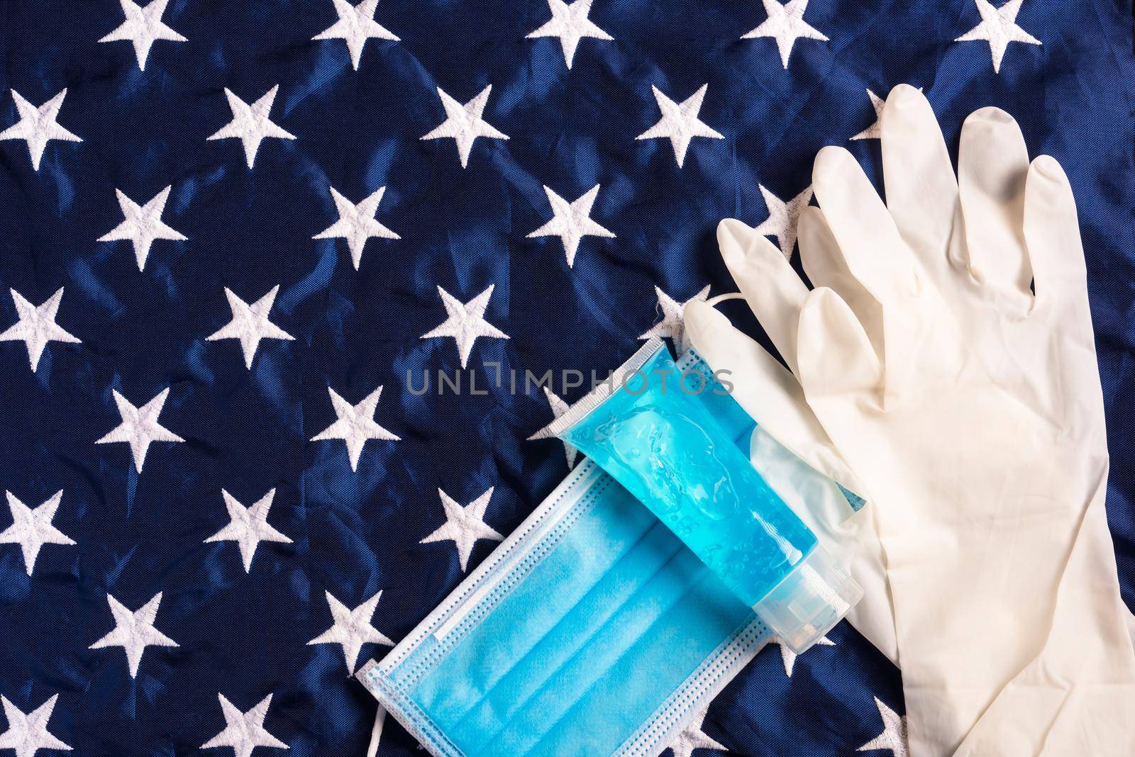 Medical protective disposable face mask for cover mouth on blue America star flag by Sorapop