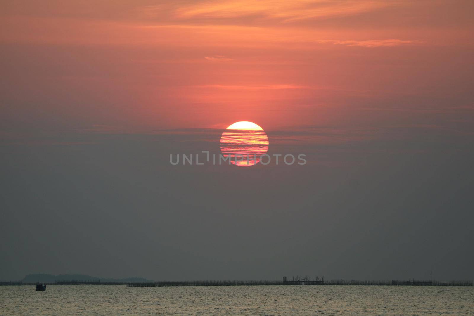 sunset back onsilhouette red orange sky evening cloud and dark sky over horizon sea