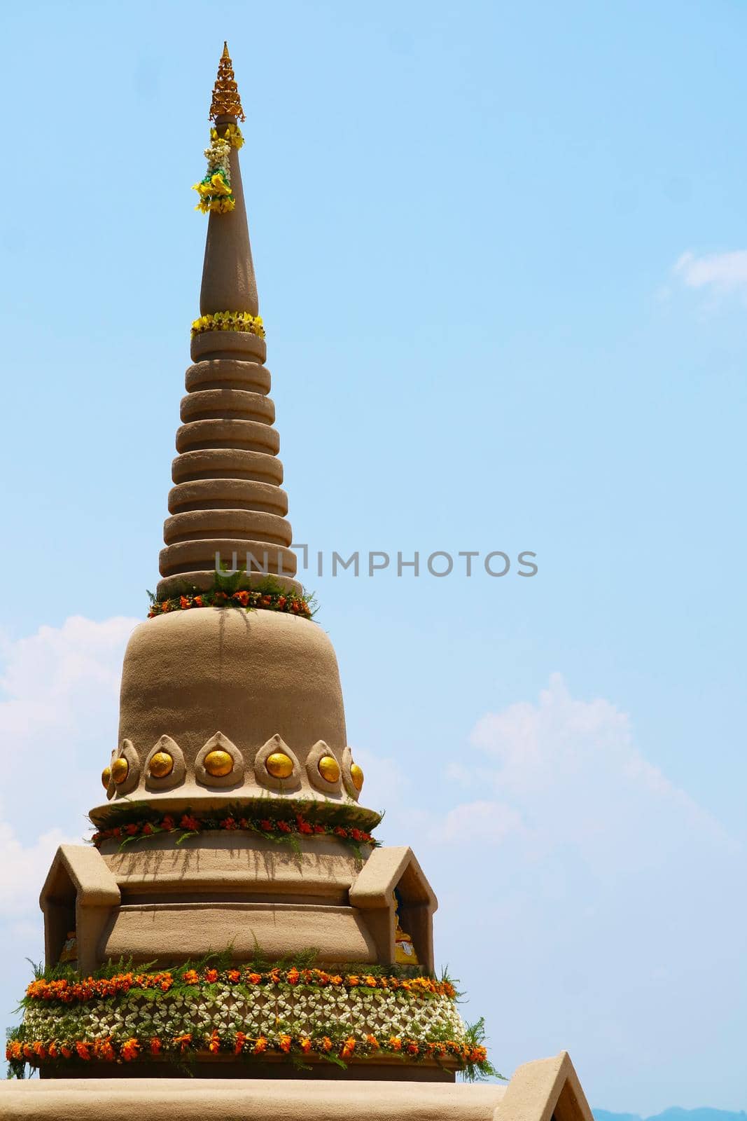 top of sand pagoda was carefully built, and beautifully decorated in Songkran festival by Darkfox