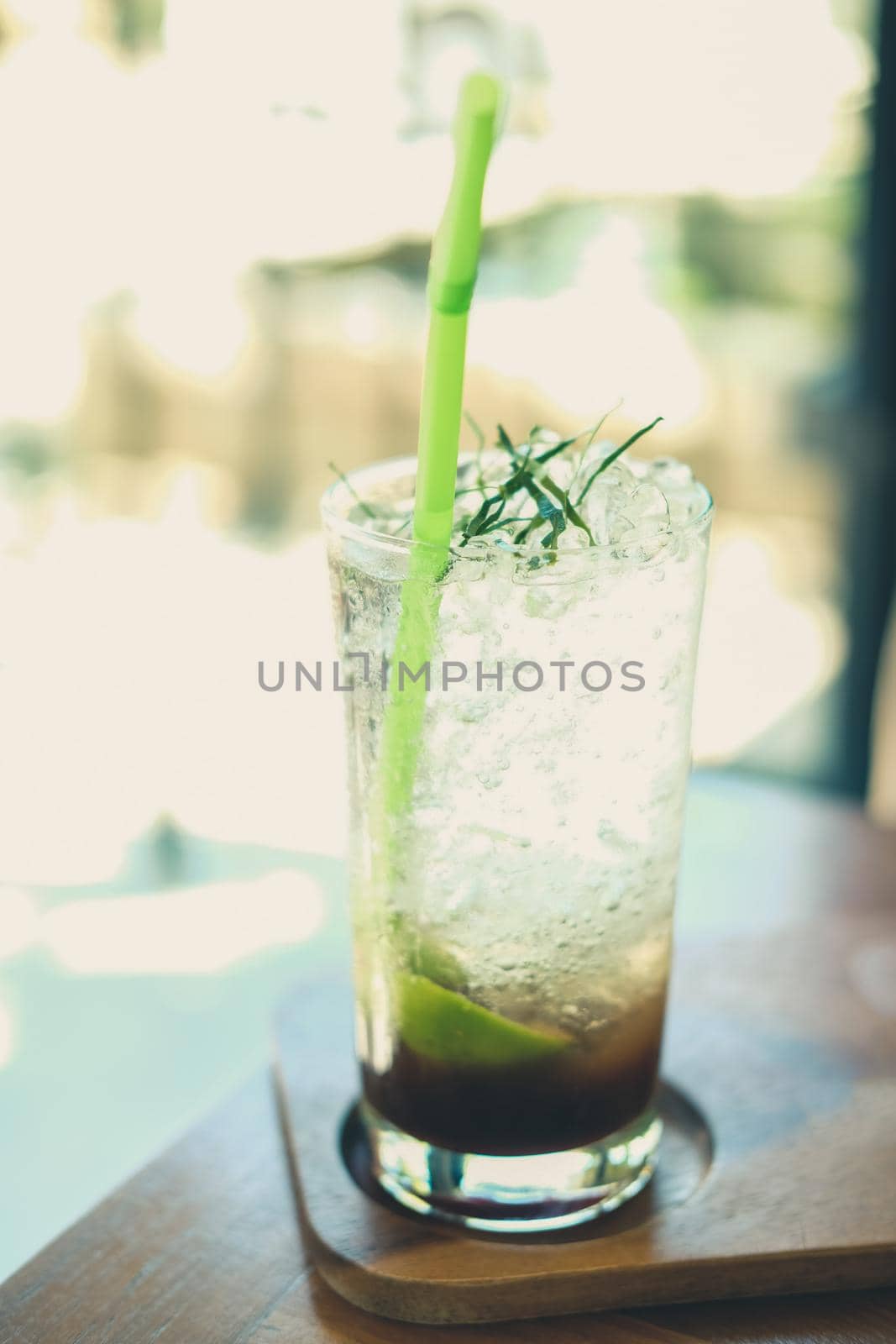 tamarind juice soda with kaffir lime leaves. mocktail beverage