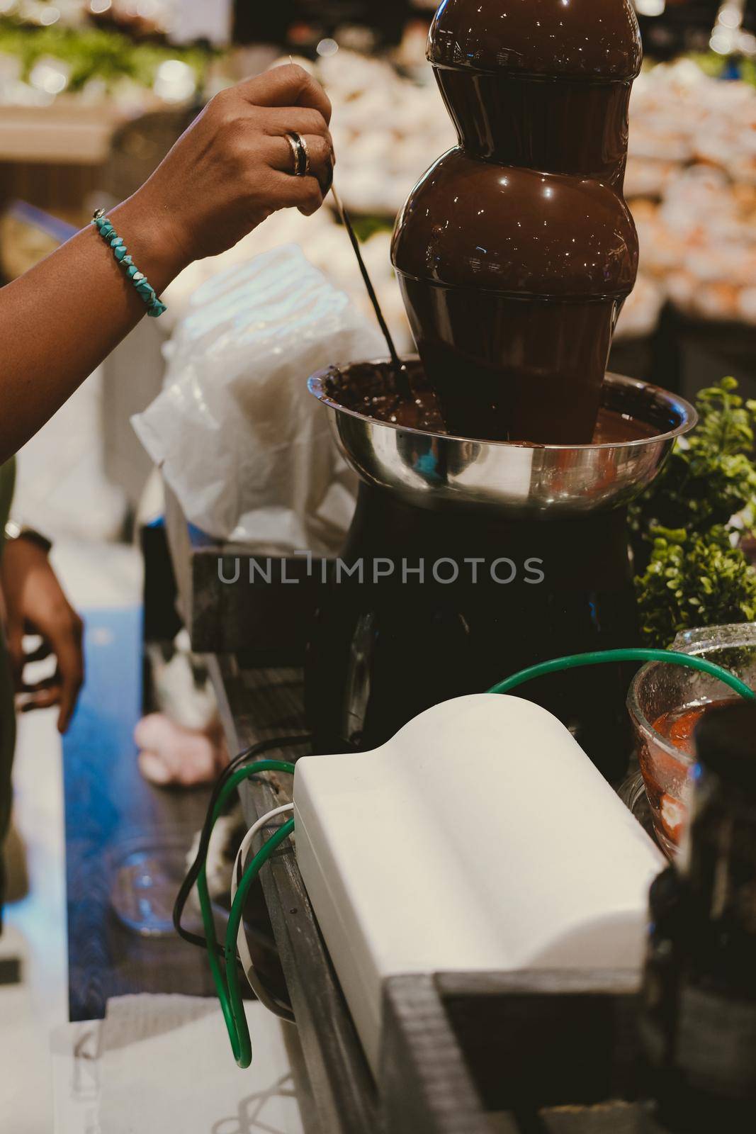 chocolate fondue fountain dripping sauce