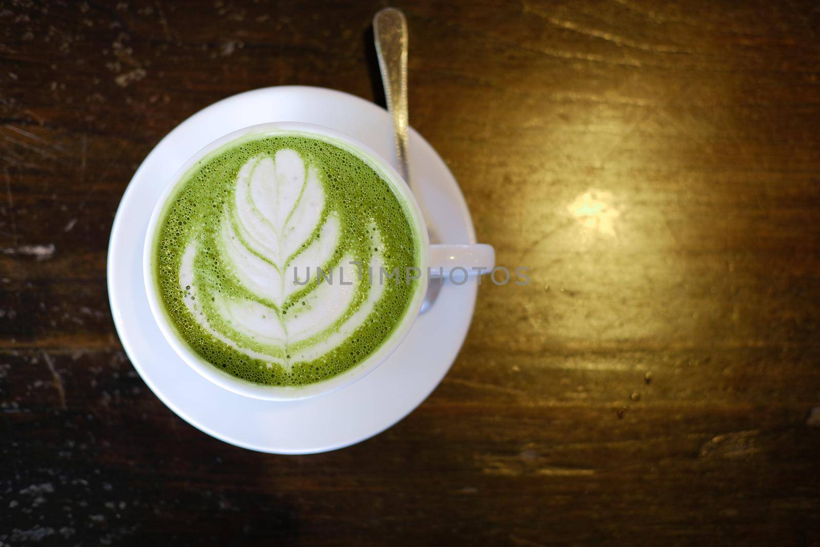 hot japanese matcha green tea with latte art.
