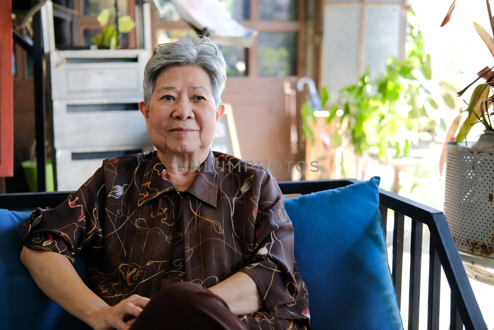 asian old elder woman elderly relaxing resting at home. senior leisure lifestyle