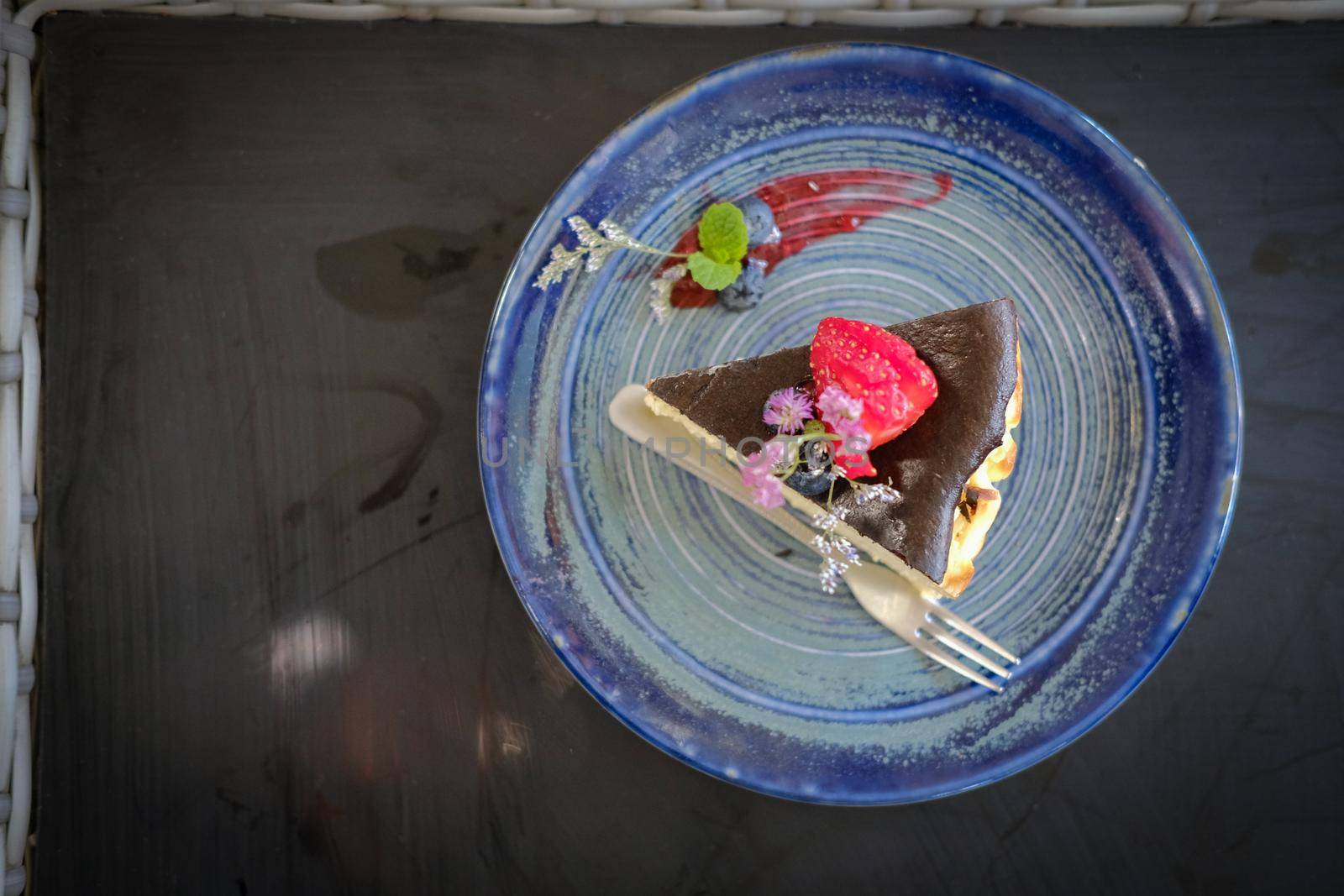 keto vegan flourless cheesecake decorating with flower. ketogenic low carb and gluten-free diet