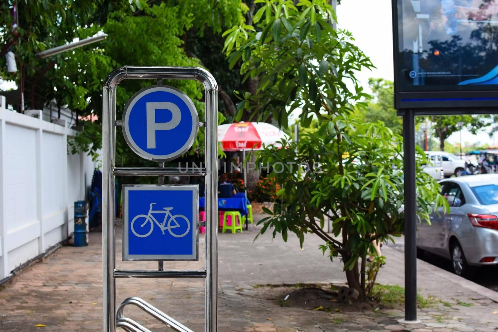 Bicycle parking on the pavement by iPixel_Studio