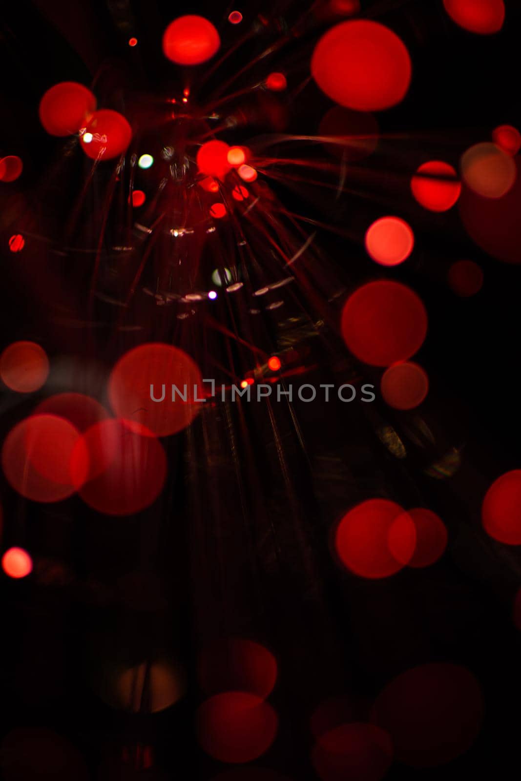 Red bokeh light celebrate at night, defocus light abstract background.