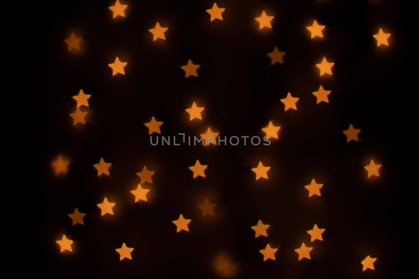 Yellow Star Shaped Bokeh by bju12290