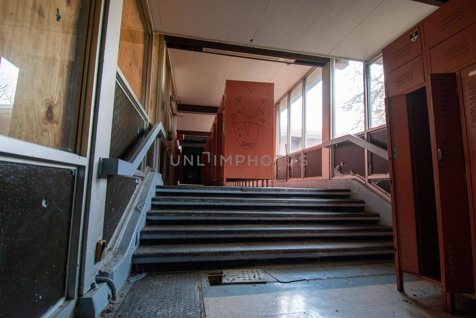 A Locker Room With Red Lockers in an Abandoned School