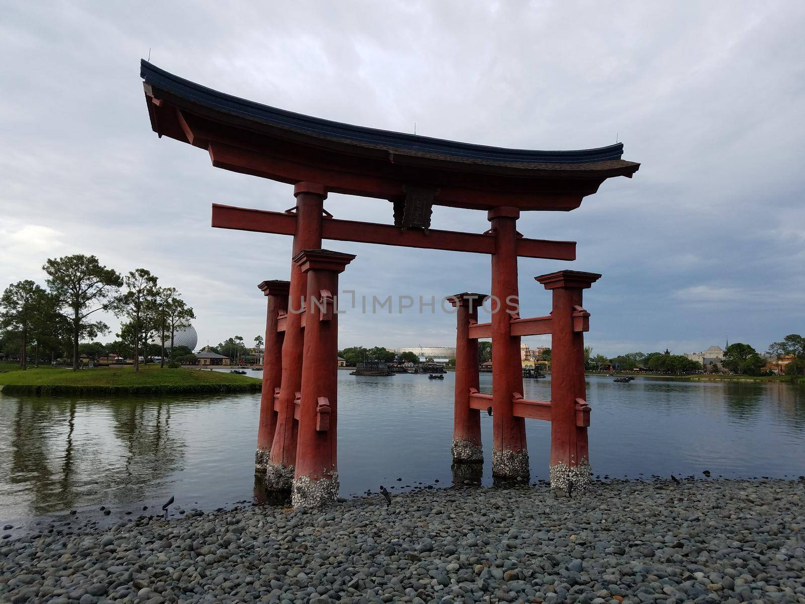 Japanese spiritual gate in blue water water