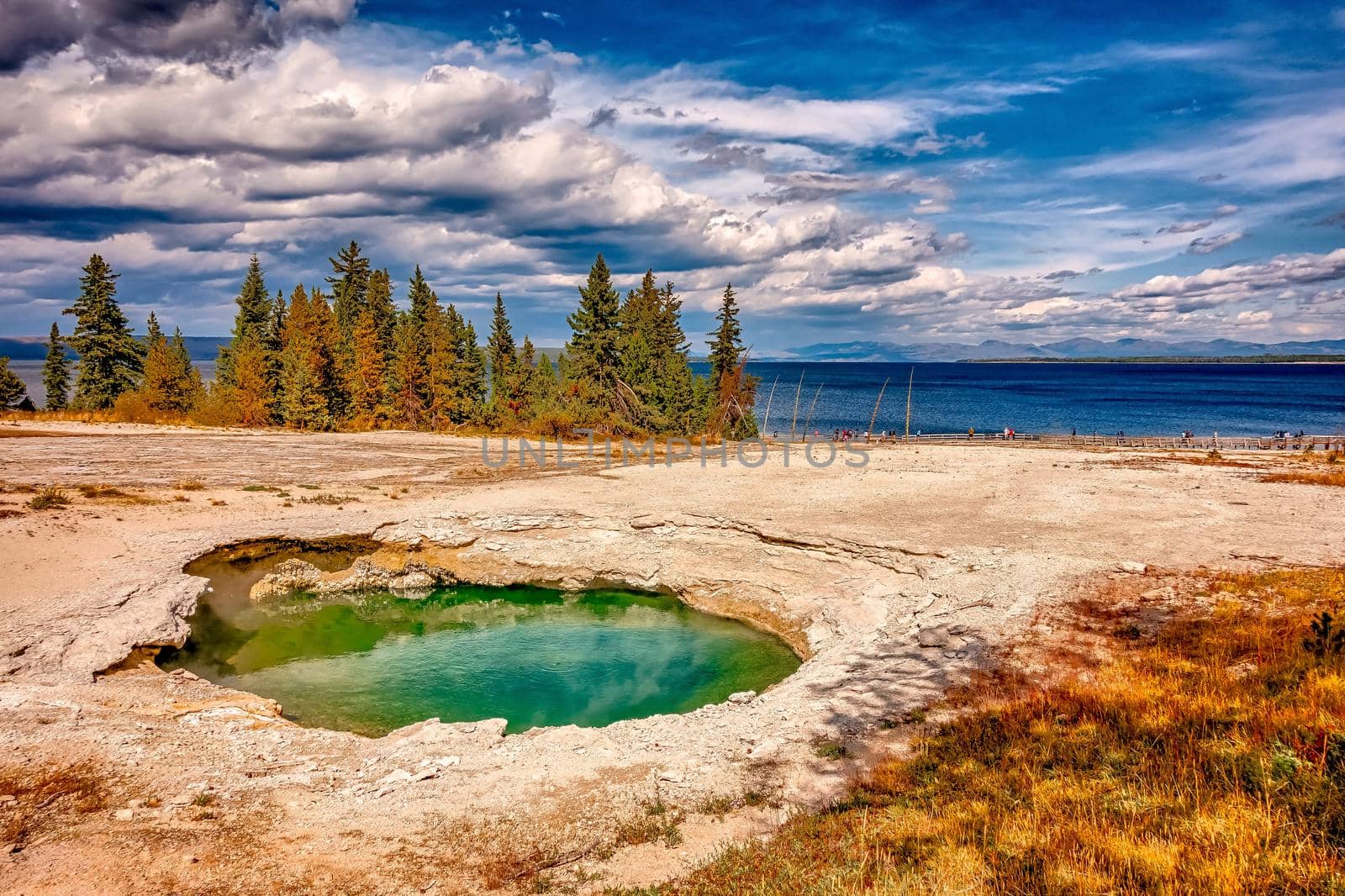 Hot thermal spring Abyss Pool in Yellowstone National Park, West Thumb Geyser Basin area, Wyoming, USA by digidreamgrafix