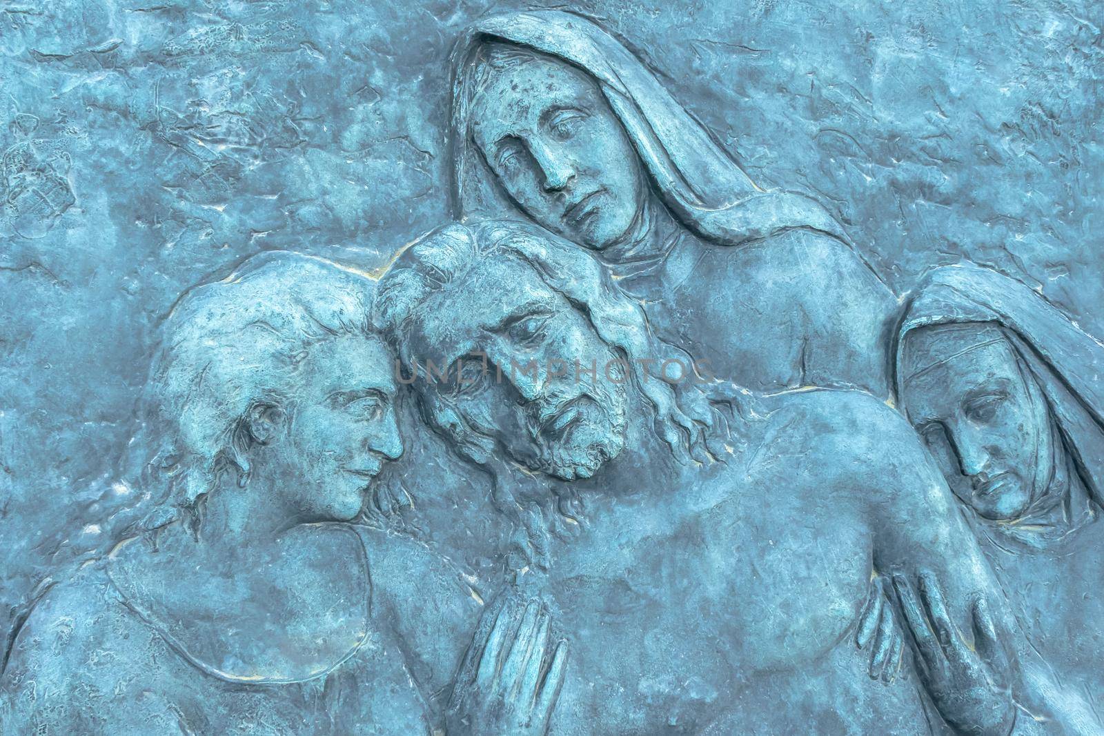 Beautiful light blue low relief depicting Jesus Christ and his death.