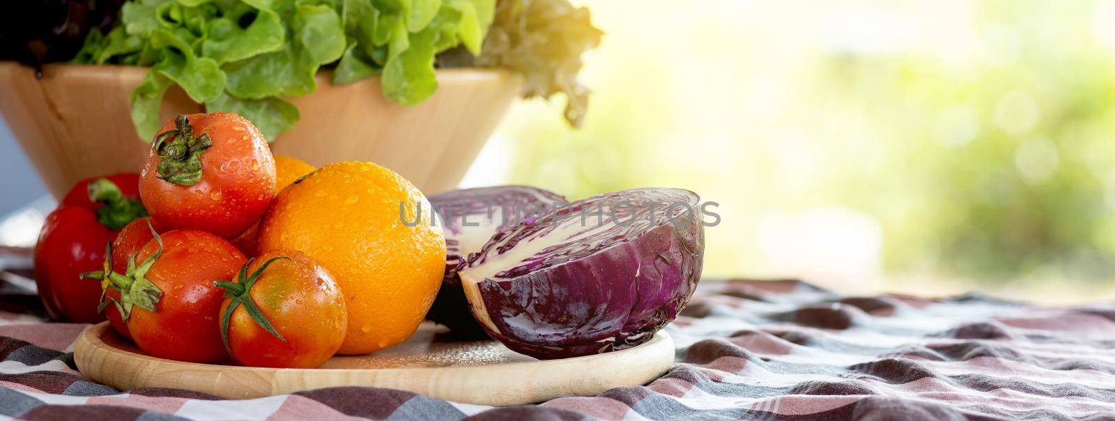 Fresh organic raw vegetable and fruit in bowl for salad on table, vegetarian and healthy food or ingredient and herb for cooking health, harvest for farm, nutrition concept, banner website.