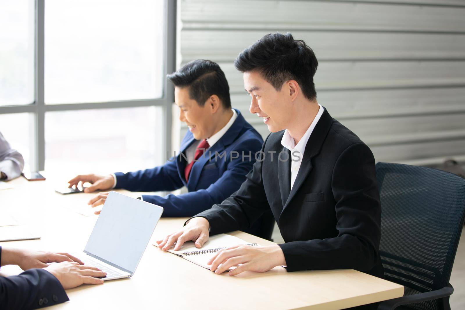 Multiethnic diverse group of business coworkers in team meeting discussion