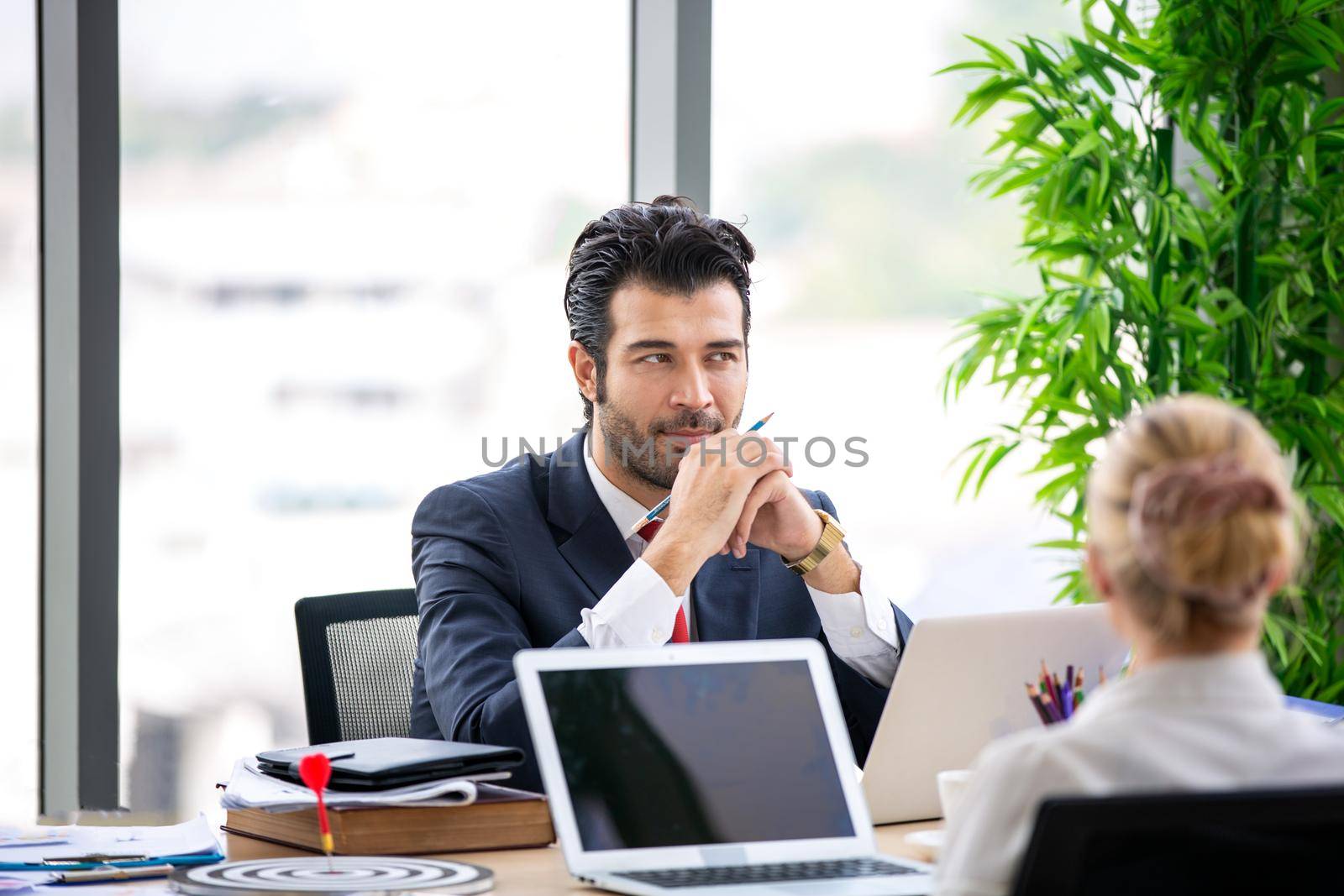 Multiethnic diverse group of business coworkers in team meeting discussion